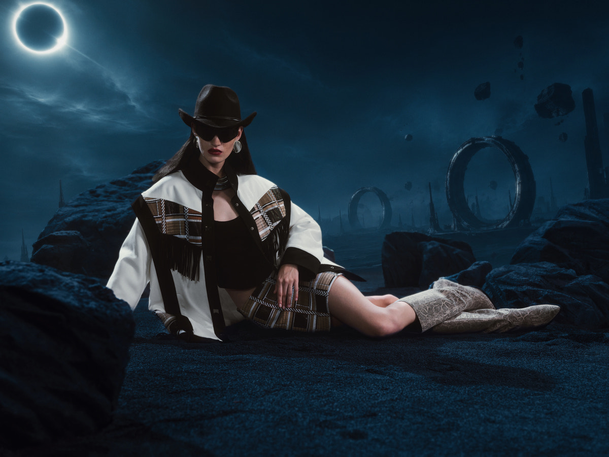 Model wearing Align Coat beneath the eclipse