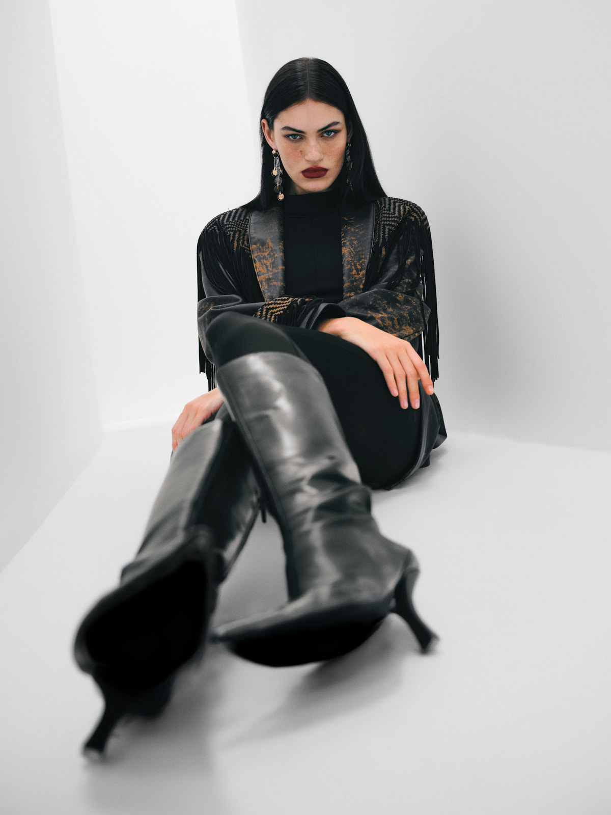 Two models responding to each other in a white space